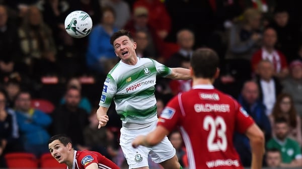 Ronan Finn of Shamrock Rovers in action against Ciarán Coll of Derry City