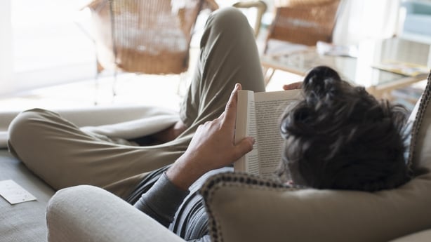 man reading book