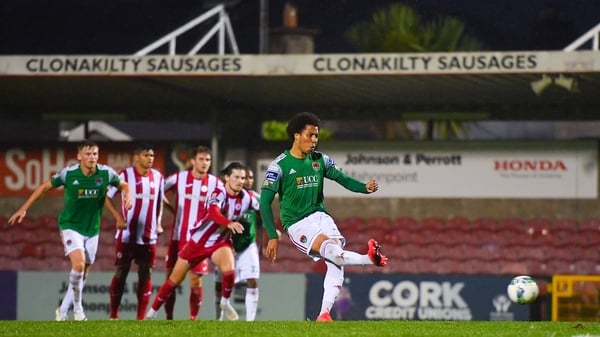Kit Elliot of Cork City slots home his side's second goal from the penalty spot