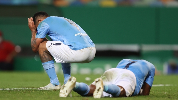 Raheem Sterling of Manchester City and Gabriel Jesus react at the final whistle