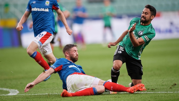 Linfield were eliminated despite a strong effort against Legia Warsaw