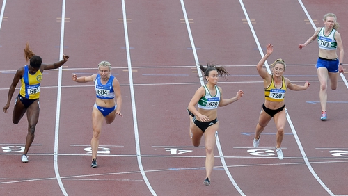 Ciara Neville (C) winning the 100m at last year's championships
