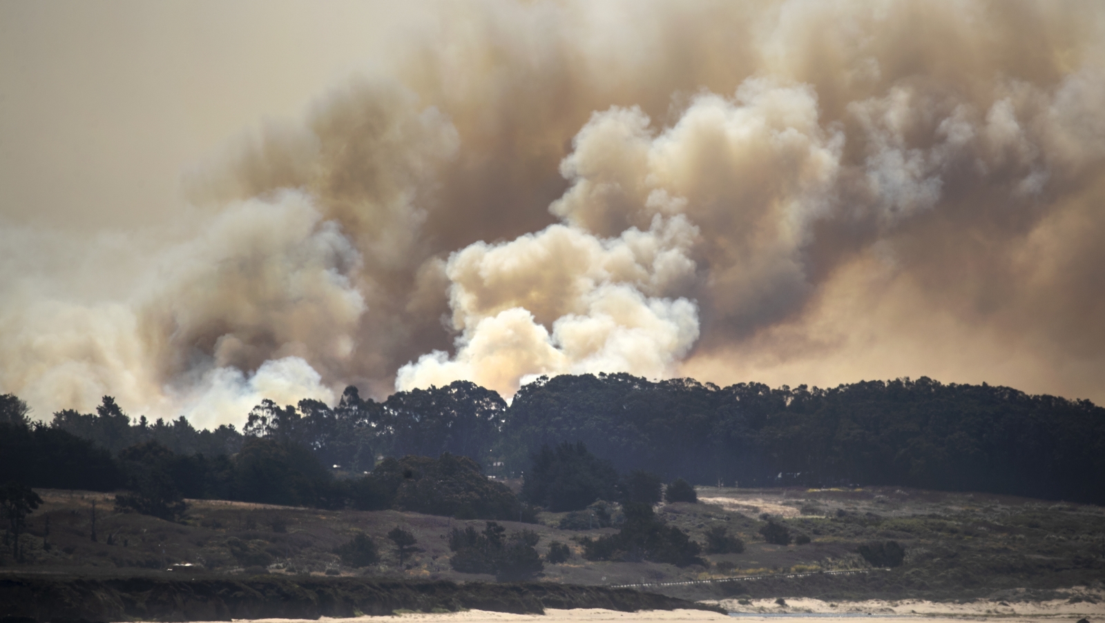 California Fires Force Thousands To Flee Homes