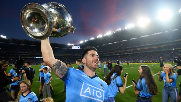 Michael Darragh Macauley celebrates with the Sam Maguire cup last September