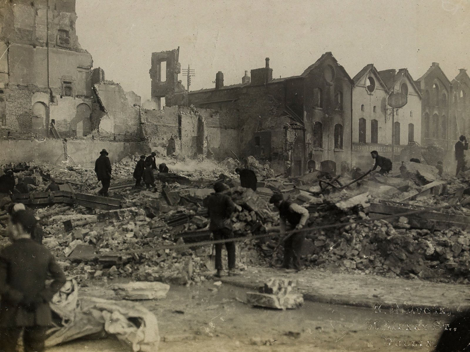 Image - The ruins of Cash's department store after its destruction by the Crown Forces. Image courtesy of the National Library of Ireland