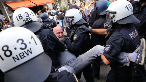 Police removed a number of people from the protest in Berlin