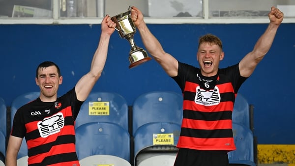 Ballygunner joint captains Barry Coughlan, left, and Philip Mahony lift the trophy
