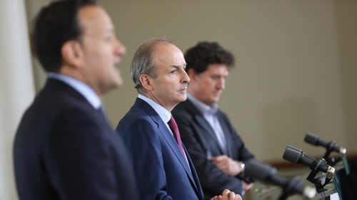 Micheál Martin (c) will be replaced as Taoiseach tomorrow (Pic: RollingNews.ie)
