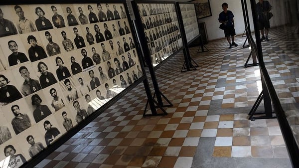 Photographs of prisoners on display at the genocide museum at Tuol Sleng, the former prison S-21 used by the Khmer Rouge to imprison and torture thousands of Cambodians during the 1970s, in Phnom Penh