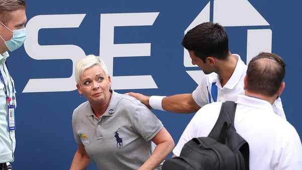 Novak Djokovic hit line judge Laura Clark in the throat with a tennis ball after a wayward swipe