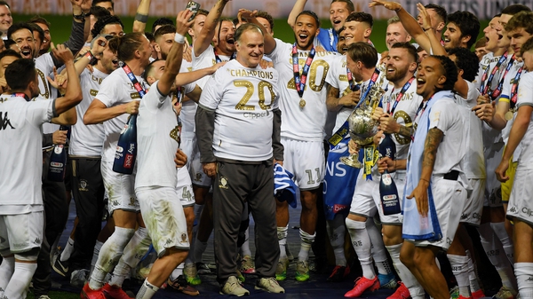 Marcelo Bielsa celebrates the Championship title with his players