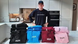 Mark Donnelly with his HUH hoodie collection