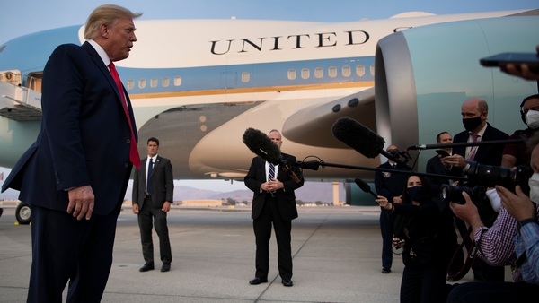 Donald Trump speaks to the media after arriving at Reno-Tahoe International Airport