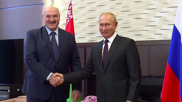 Alexander Lukashenko (L) has been left off the EU's sanctions list