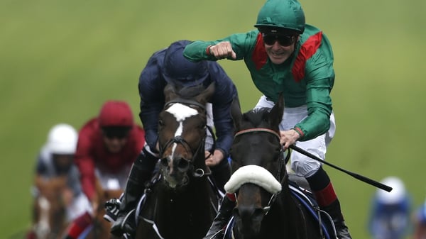 An elated Pat Smullen celebrates partnering Harzand to Derby glory at Epsom in 2016