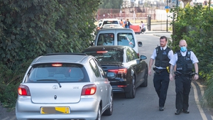 Queuing cars at a drive through test centre in Lewisham, south London
