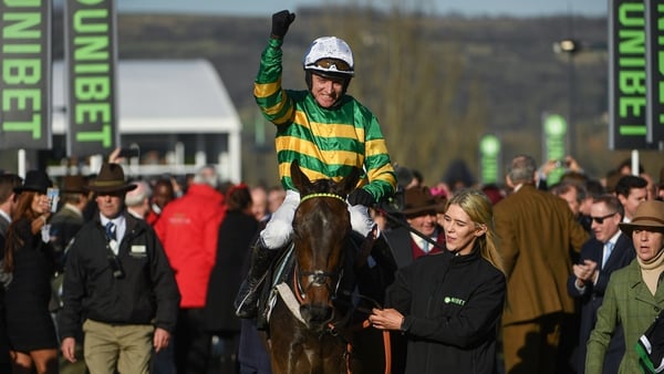Barry Geraghty celebrates after winning the 2018 Champion Hurdle with Buveur D'air