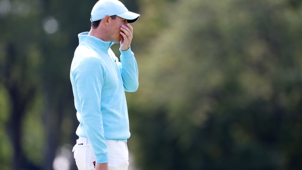 Rory McIlroy's final-round chances evaporated after he four-putted the first