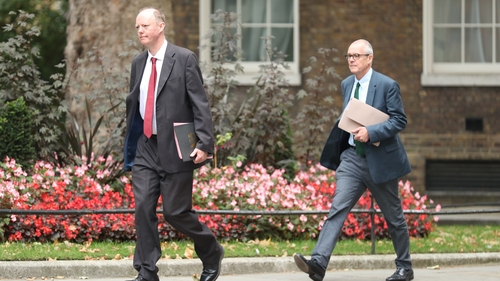 Chris Whitty (left) and Patrick Vallance arrive in Downing Street