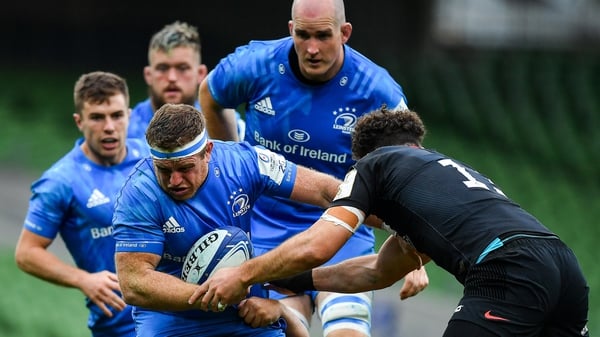 Sean Cronin of Leinster is tackled by Jamie George and Duncan Taylor of Saracens