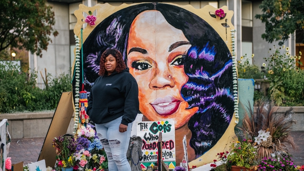 Breonna Taylor's mother Tamika Palmer pictured in front of a mural of her daughter in Louisville (File image)