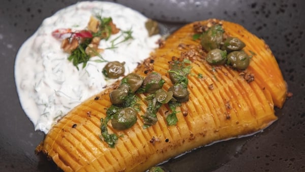 Eunice Power's Hasselback butternut squash with roast walnut and chilli Tzatziki with caper and parsley oil.