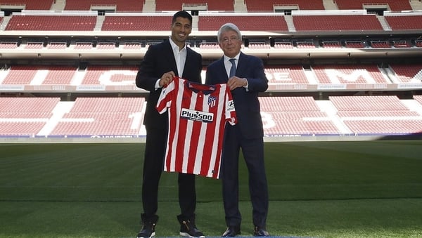 Luis Suarez is officially an Atletico Madrid player