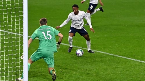 Raheem Sterling scores his side's second goal