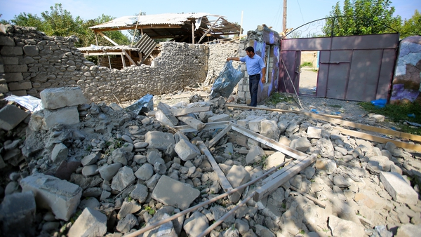 A house damaged following recent shelling clashes between Armenian separatists and Azerbaijan