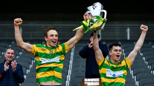 Michael O'Halloran, left, and Cathal McCormack of Blackrock lift the Sean Óg Murphy Cup