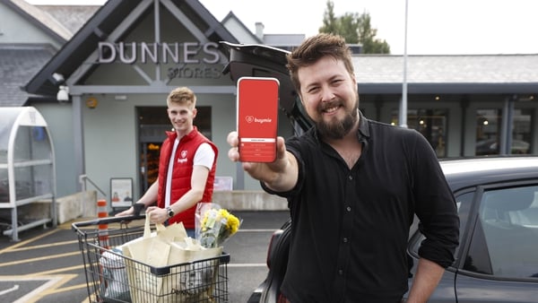 Devan Hughes, CEO and co-founder of Buymie, signs a new deal with Dunnes for the grocer's Dublin and Cork customers