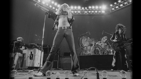 British heavy rock group Led Zeppelin, performing at Earl's Court, London, May 1975.