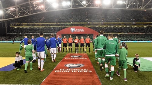 Ireland and Bosnia and Herzegovina walk out onto the pitch before the start of their Euro 2016 play-off at the Aviva