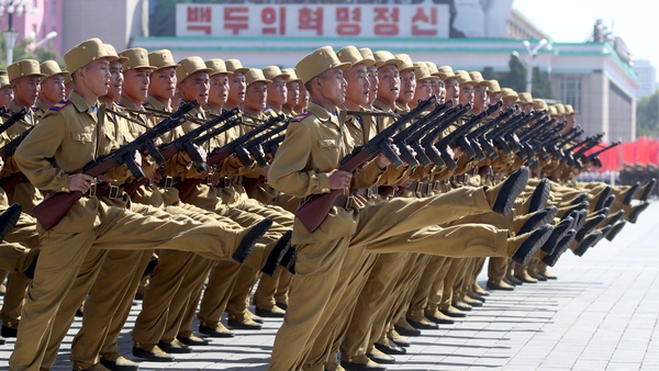 Servicemen march during a military parade marking the 70th anniversary of the foundation of North Korea in 2018
