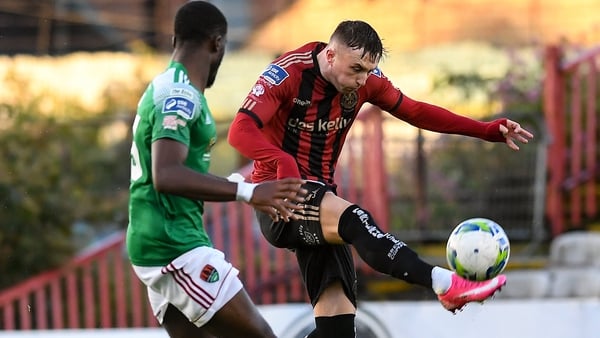 Danny Grant of Bohemians shoots to score his side's second goal