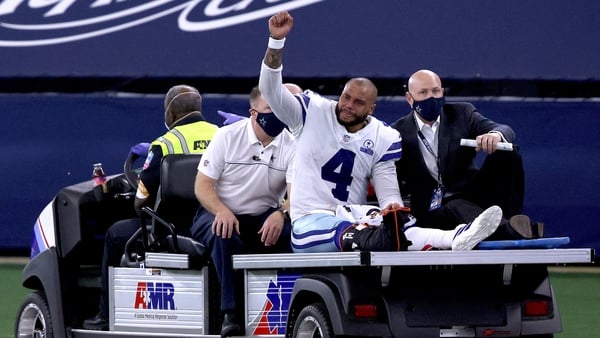 Dak Prescott is carted off the field after sustaining the leg injury