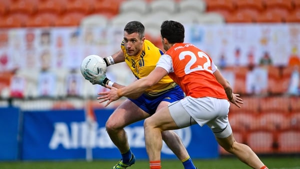 Cathal Cregg of Roscommon in action against James Morgan