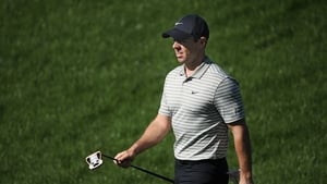 Rory McIlroy walks on the second hole during the third round