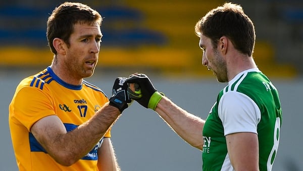 Gary Brennan of Clare (l) and Eoin Donnelly of Fermanagh acknowledge each other at full-time