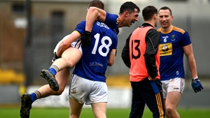 Rory Finn picks up Padraig O'Toole as Wicklow celebrate their victory on enemy territory