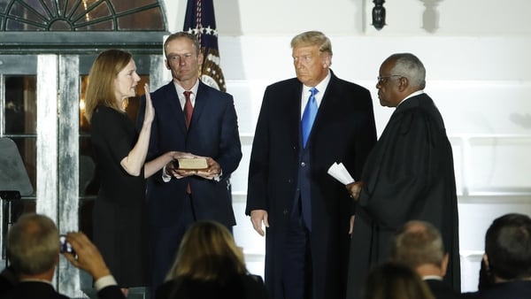 Amy Coney Barrett was sworn in by Supreme Court Justice Clarence Thomas (R)