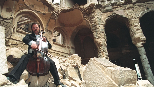 Cellist Vedran Smailovic plays Strauss in the bombed National Library in Sarajevo on September 2 1992