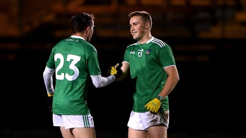 Limerick's Davey Lyons and Hugh Bourke celebrate after the win in Waterford