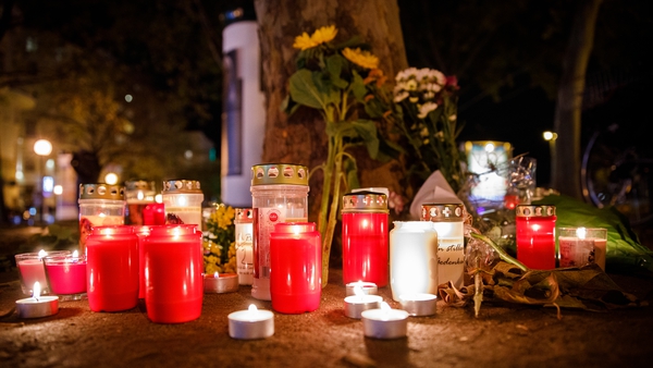 Candles and flowers tonight near the scene of multiple shootings in Vienna, Austria