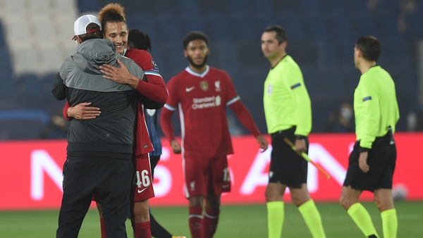 Jurgen Klopp hugs Rhys Williams following Liverpool's win over Atalanta