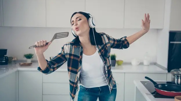 Kitchen karaoke really is a tonic (iStock/PA)