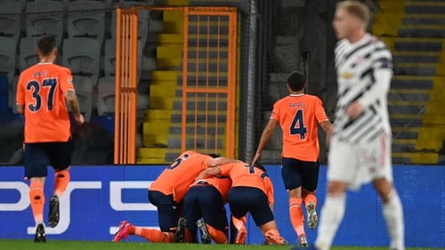 Demba Ba celebrates Basaksehir's opening goal against Manchester United with team-mates
