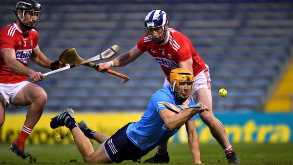 Éamon Dillon of Dublin comes under pressure from Seán O'Donoghue (r) and Colm Spillane