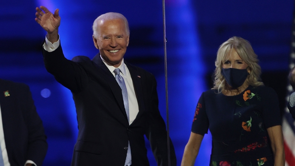 President-elect Joe Biden and his wife Jill to the crowd after address at the Chase Center in Wilmington, Delaware
