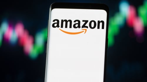 Amazon said it was working with Visa to resolve a dispute over payment fees
